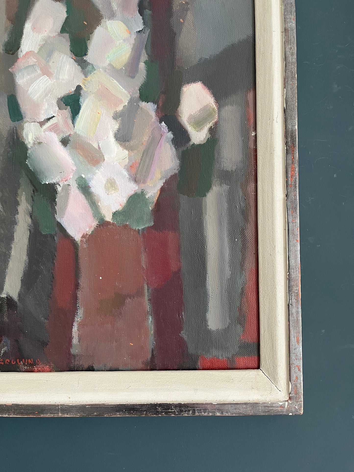 Roses in Red Vase